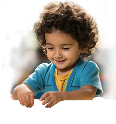 Happy child playing with colorful wooden building blocks